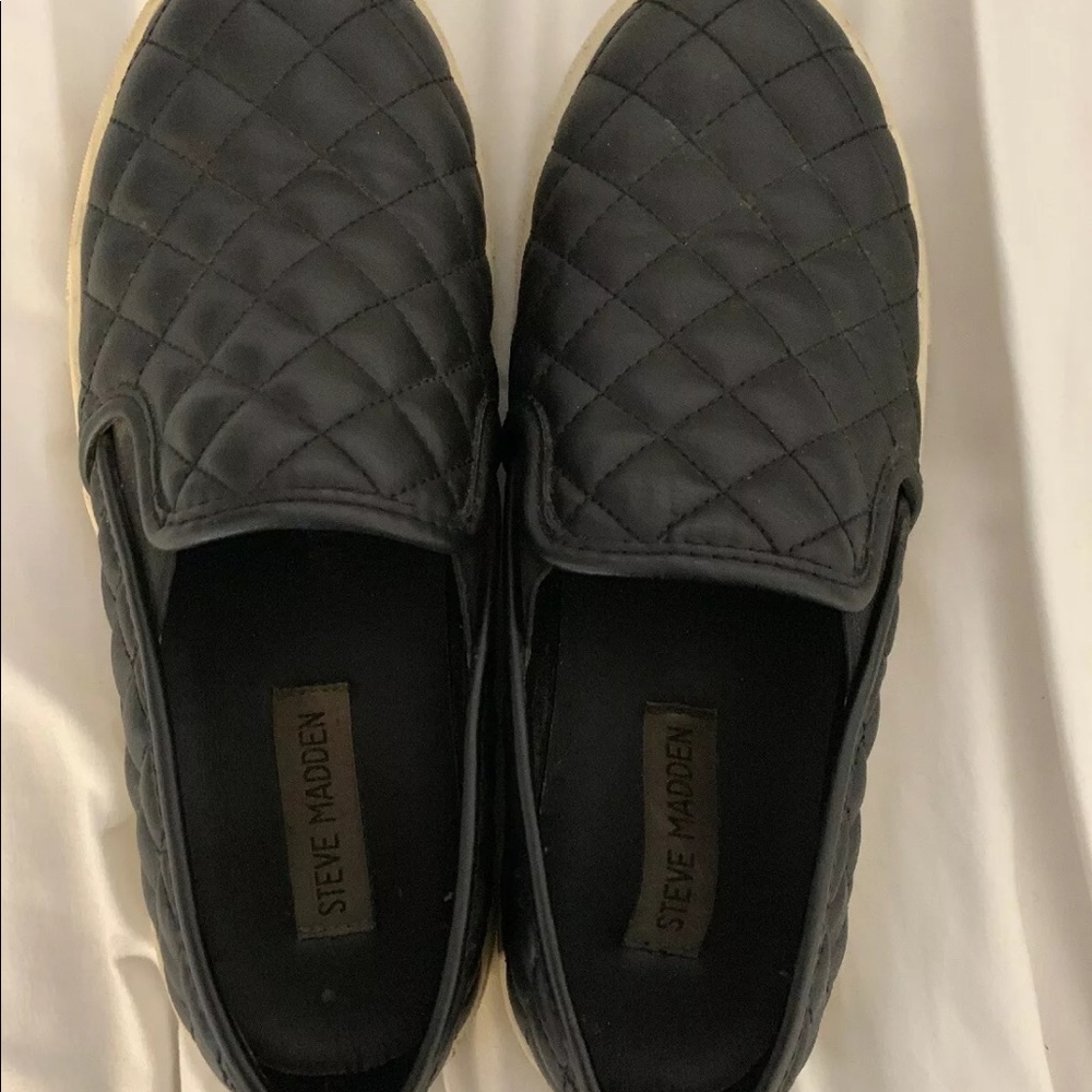 Black Steve Madden slip ons